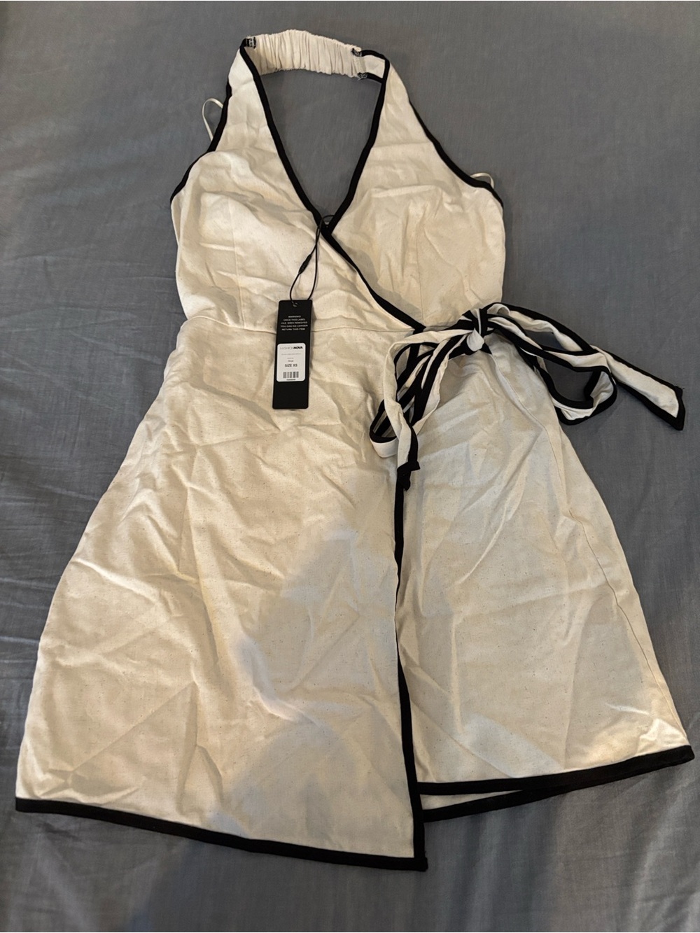 Cream Wrap Halter Dress with Black Trim